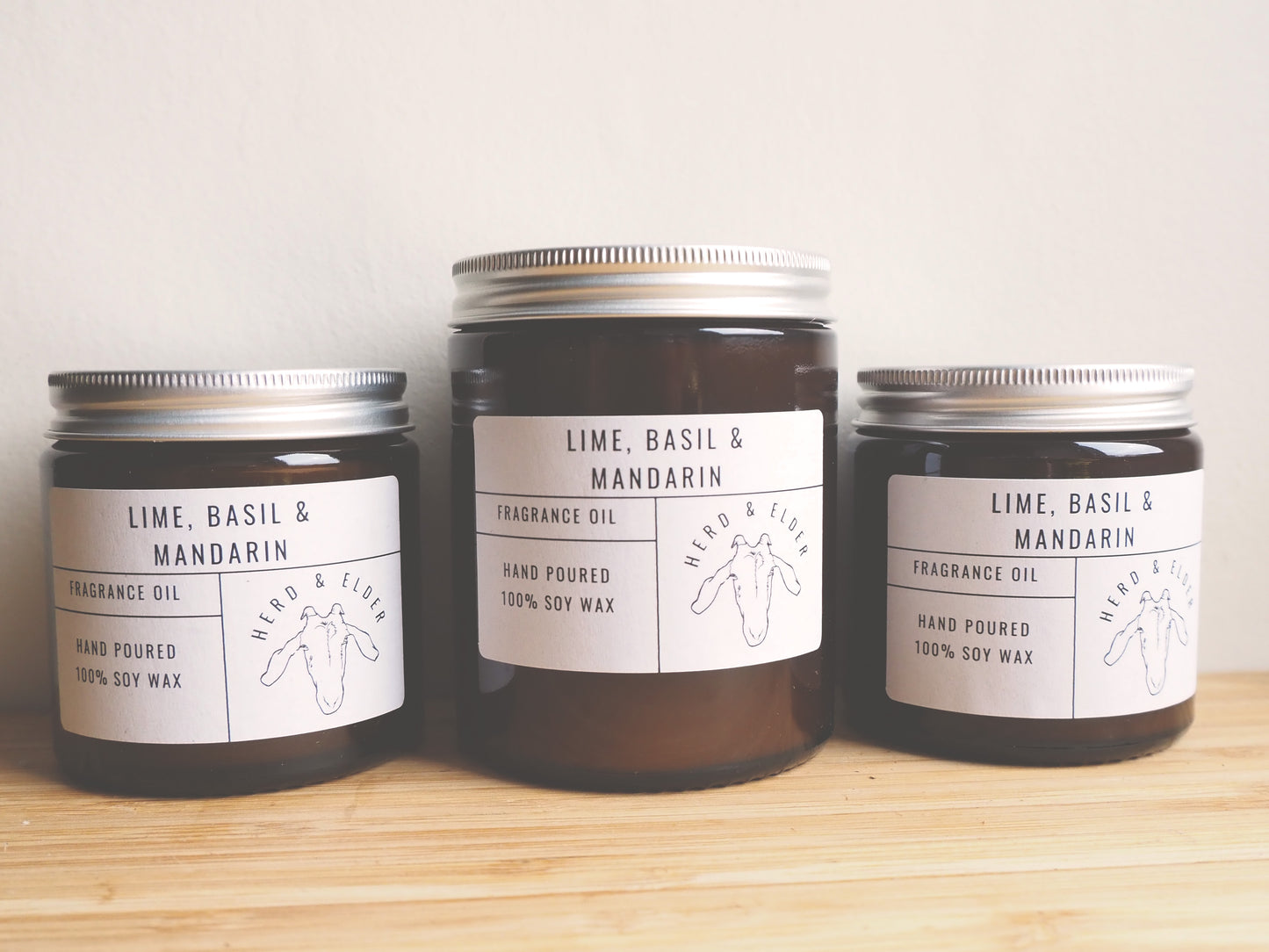 Lime Basil and Mandarin Soy Wax Candle jars from Herd & Elder, showcasing fresh fragrance oil and eco-friendly materials.