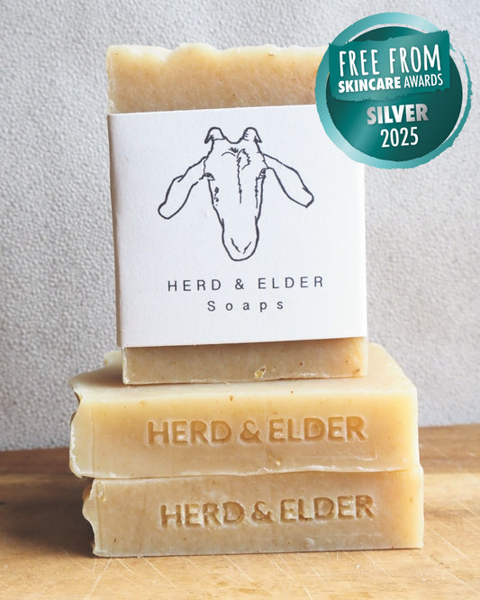 Goat and oat milk soap bar stacked with Herd & Elder branding, awarded Silver in Free From Skincare Awards 2025.