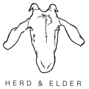 Logo of Herd & Elder featuring a goat's head illustration, emphasizing natural goat milk products.