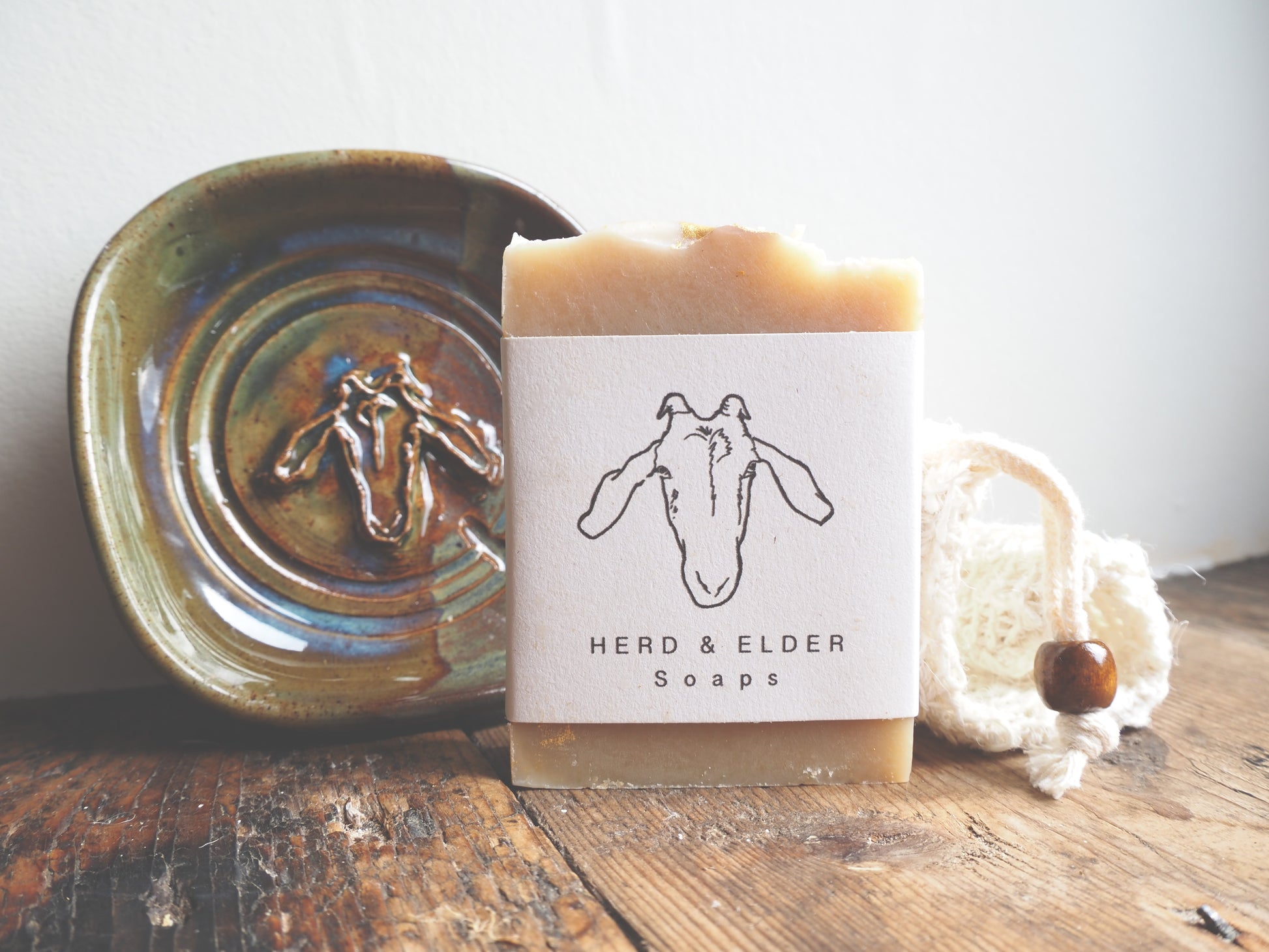 Gift set featuring a handmade green soap dish and Herd and Elder soap, beautifully boxed and artisan crafted.
