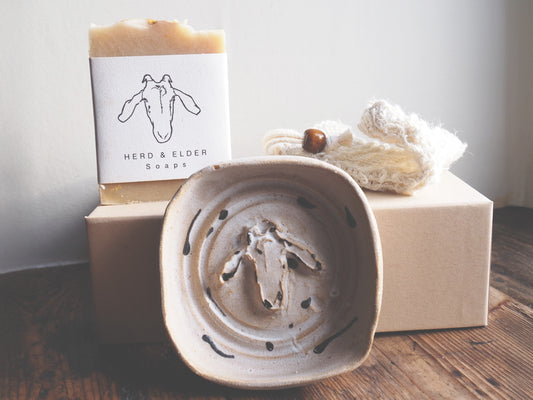 Gift set featuring handcrafted white stoneware soap dish and Herd and Elder soap, beautifully boxed and ready to give.