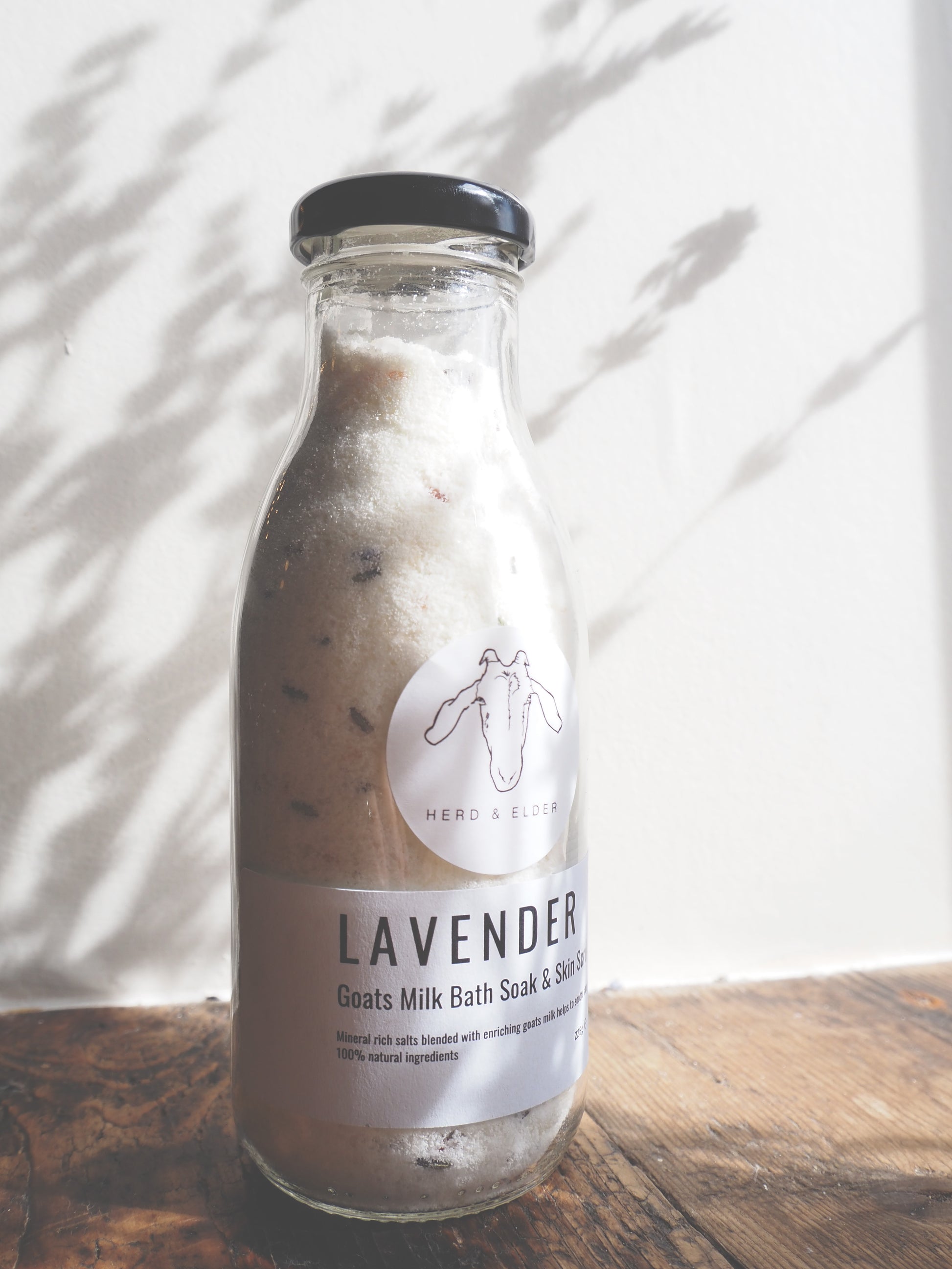 Luxury Goat Milk Bath Salts – Lavender & Botanical Soak with Essential Oils in a glass bottle for relaxing bath time.